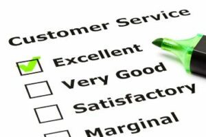 Customer service evaluation checklist form with green tick on "Excellent" with felt tip pen.