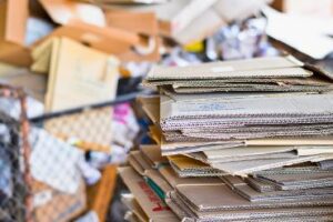 Paper packed and cardboard corrugated paper ready to be shredded