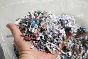 A handful of shredded paper, shredded checks, credit cards and other sensitive information and more to prevent identity theft